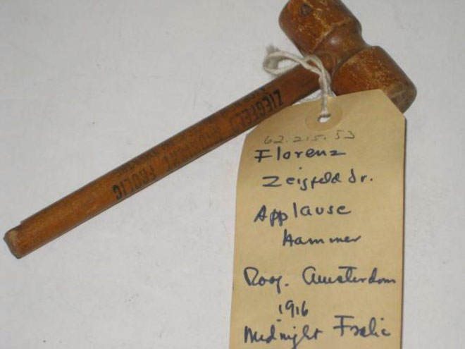 Souvenir – wooden applause hammer from Ziegfeld’s Midnight Frolic atop New Amsterdam Theatre, ca. 1916. Museum of the City of New York, 62.215.53