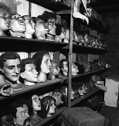 Wax heads sit on shelves in Hattie McKeever’s workshop