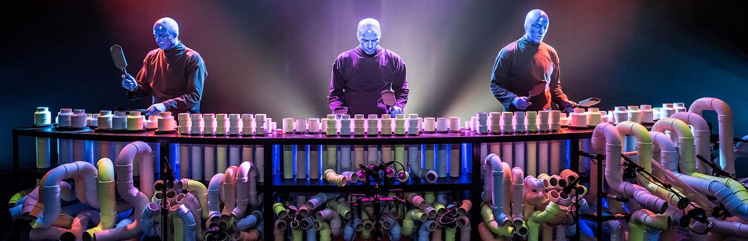 Blue Man Group performing at the pipes