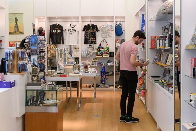A man standing in the MCNY shop