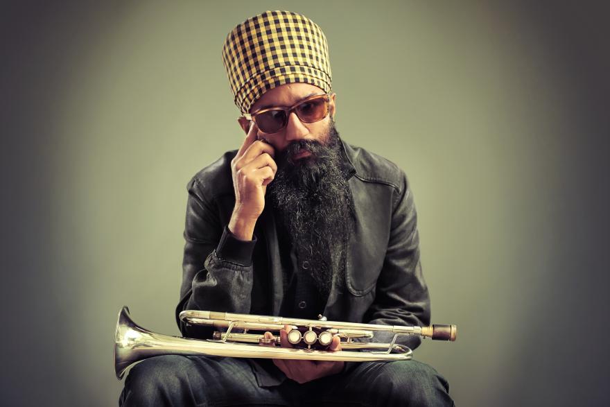 Photo of Sonny Singh with his trumpet