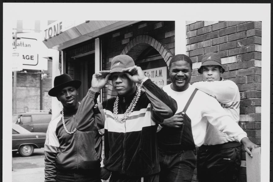 An Image of Image: a black and white image of LL Cool J with Cut Creator, E-Love, and B-Rock