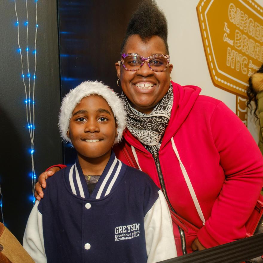 a woman and child at NYC gingerbread community day