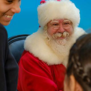 Image of Santa at MCNY with 2 Kids surrounding