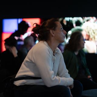 Two women watching films